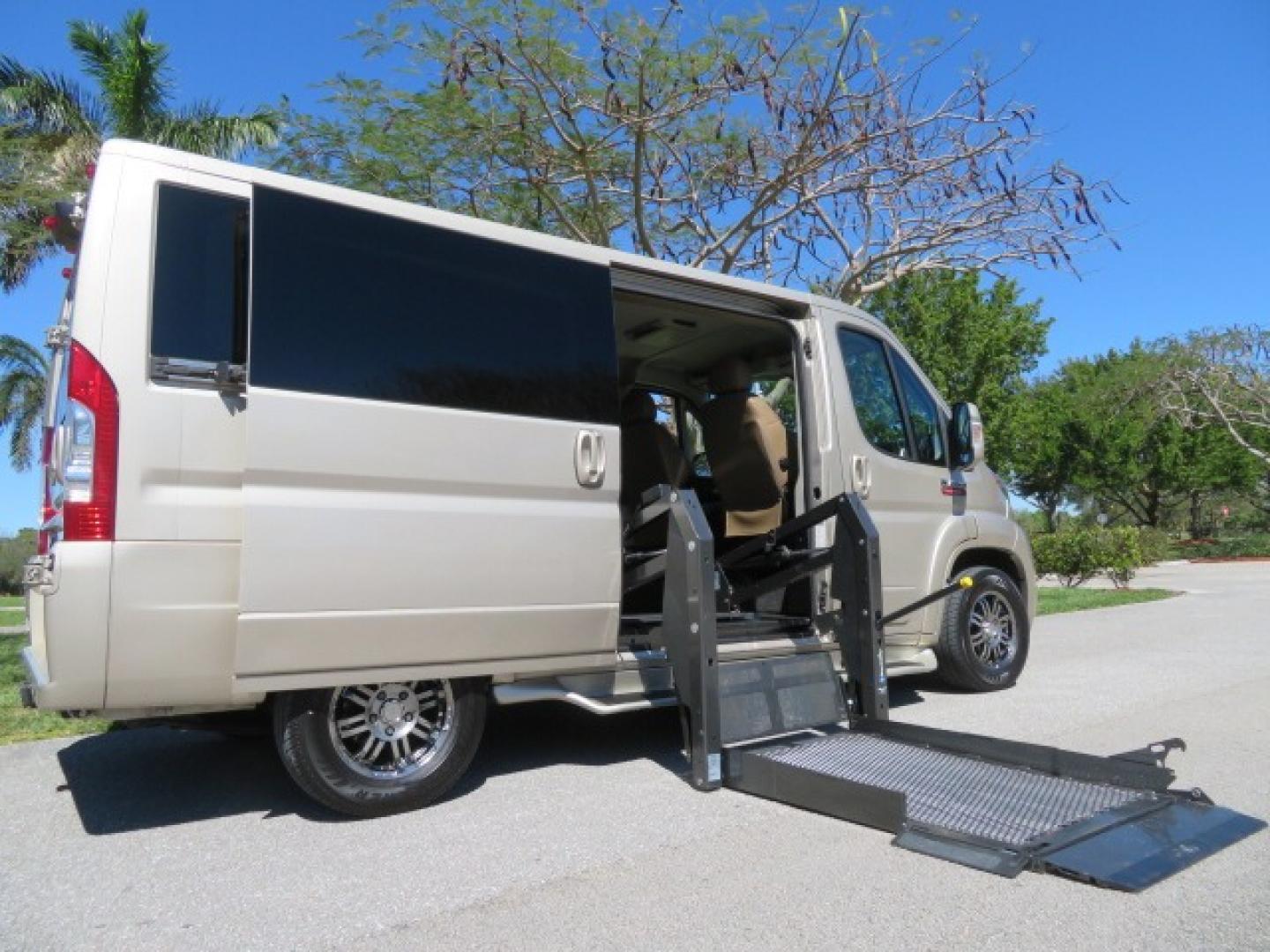 2016 Gold /Tan and Black Leather RAM Promaster (3C6TRVAG5GE) , located at 4301 Oak Circle #19, Boca Raton, FL, 33431, (954) 561-2499, 26.388861, -80.084038 - You are looking at a Gorgeous 2016 Ram Promaster Tempest X Handicap Wheelchair Conversion Van with 30K Original Miles, Lowered Floor, Dual Side Entry Doors, Power Passenger Side Entry Door, 750lb Braunability Wheelchair Lift, 4 Passenger Rear Power Bench Seat/Bed, Navigation, Rear Entertainment, Sur - Photo#2